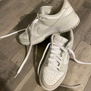 Nike Dunks (white women’s size 7). Worn twice. In excellent condition.